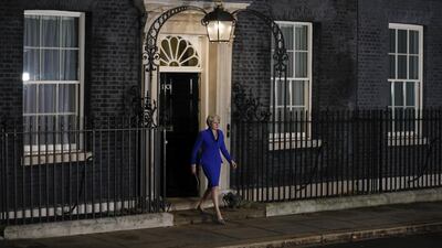 Theresa May walks out to deliver a speech, after winning a confidence vote. Luke MacGregor/Bloomberg