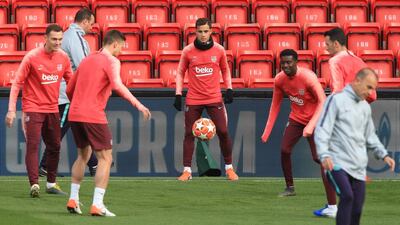 Barcelona midfielder Philippe Coutinho, centre, takes part in training at Anfield ahead of the Uefa Champions League semi-final, second leg against Liverpool. AFP