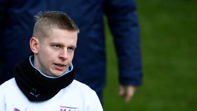Manchester City's Ukrainian midfielder Oleksandr Zinchenko reacts as he attends a team training session at City Football Academy in Manchester, north west England on March 8, 2022, on the eve of their UEFA Champions League round of 16 second leg football match against Sporting Lisbon. (Photo by Oli SCARFF / AFP)