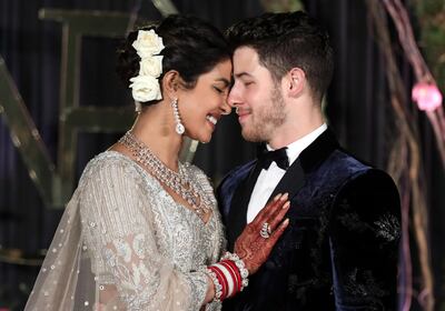 Priyanka Chopra and Nick Jonas pose for photographs during a reception in New Delhi, India on December 4, 2018. EPA