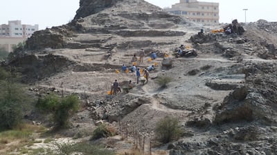 Archaeologists work at Masafi 5 in 2017. There are several ancient settlements at Masafi, a town in the foothills of the UAE's Hajar Mountains. Photo: French Archaeological Mission in the UAE