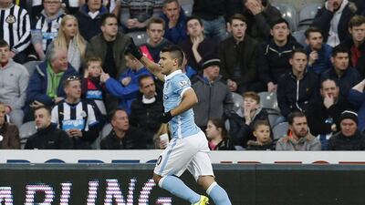 Sergio Aguero celebrates after scoring the first goal for Manchester City. Andrew Yates / Reuters