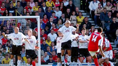 Thierry Henry scores for Arsenal against Derby in 2001. AFP