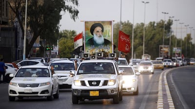 A portrait of Iraq's Ayatollah Ali Al Sistani on a street. Photo: AFP