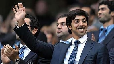 Sheikh Mansour raised his hand to acknowledge the applause on his arrival.