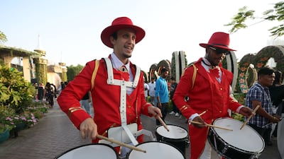 Musicians welcome visitors to the Dubai site