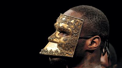 Deontay Wilder wears a mask during his ring entrance for the title fight against WBC heavyweight champion Bermane Stiverne in January, 2015. AFP