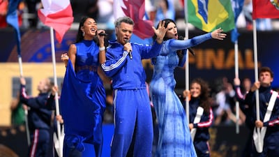 Nicole Scherzinger, Robbie Williams and Laura Pausini perform before the final. Getty