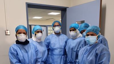 Ms Sharaf, at front, caught Covid-19 and was kept in hospital for two weeks but the experience did not deter her from the job she loves. Photo: Jasmine Mohammed Sharaf