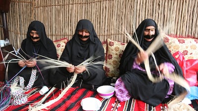 Women weaving palm fronds in Ras Al Khaimah. Randi Sokoloff / The National