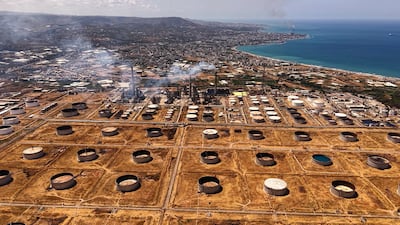 Tankers are loaded with Iraqi crude on the Mediterranean coast of Syria. Ahmad Fallaha / The National