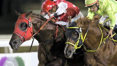 Eric Lemartinel and Tadhg O'Shea combined to win in Abu Dhabi again - this time aboard Asyyad. Erika Rasmussen for The National