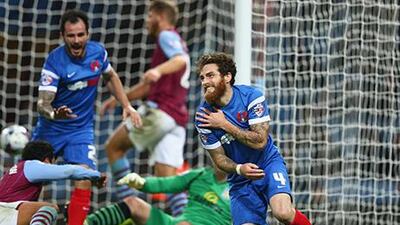 Romain Vincelot of Leyton Orient reacts after scoring his teams only goal during the English League Cup second-round match against Aston Villa in Birmingham late on Wednesday. Clive Mason / Getty Images