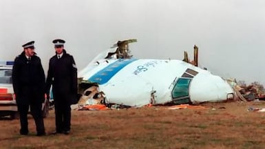 Police officers surrounded by the wreckage of the Pan Am flight 103 that exploded and crashed over Lockerbie, Scotland in 1988. AFP