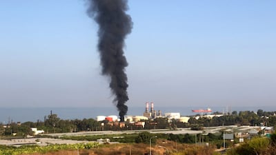 The blaze sent a plume of black smoke into the sky. AFP
