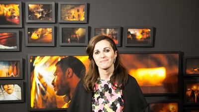Laura El Tantawy in front of her exhibition, In The Shadow of the Pyramids at Gulf Photo Plus gallery. Courtesy of GPP