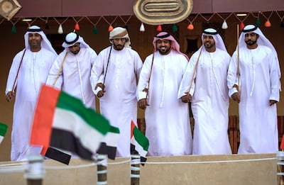 Emirati Ayala dancers at the Heritage Village of the Sheikh Zayed Heritage Festival. Victor Besa / The National