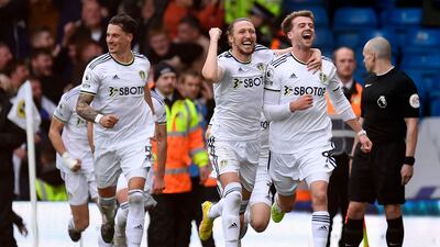 Leeds United's Patrick Bamford celebrates with teammates after scoring the opening goal. AFP
