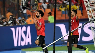 Egypt forward Mohamed Salah celebrates after scoring against DR Congo at the Cairo International Stadium. AFP