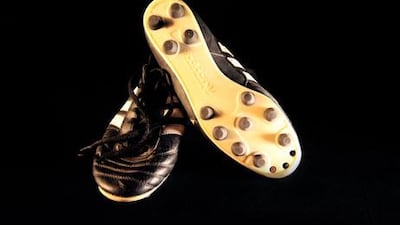 Abdulaziz Mohammed's World Cup football boots. Visit 40@40 for videos documenting the stories behind many of the historic objects in this series.