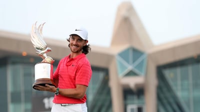 Tommy Fleetwood successfully retained the Falcon Trophy after winning the Abu Dhabi HSBC Championship. Karim Sahib / AFP