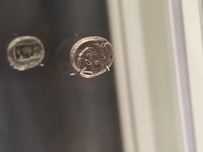 A silver coin from Lydia, the first civilisation to mint coins. Photo: Katy Gillett for The National