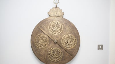 An astrolabe hangs on a wall as decoration during a VIP preview session at the official launch of AstroLabs Dubai (Sarah Dea / The National)