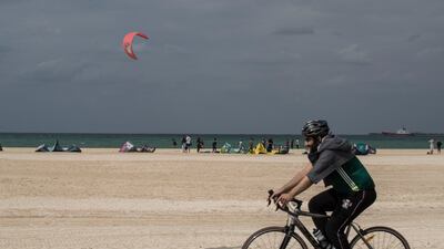 People took advantage of the overcast sky to visit Kite Beach in Dubai. Ruel Pableo for The National