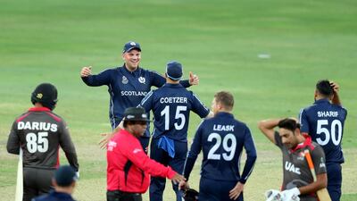 Scotland celebrate the win after beating the UAE. Chris Whiteoak / The National