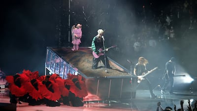 Machine Gun Kelly performs on stage. Getty