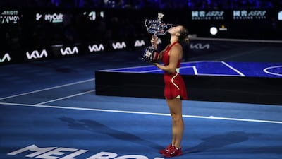Aryna Sabalenka kisses the Daphne Akhurst Memorial Cup. AP