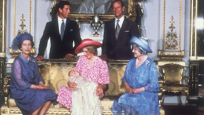 Queen Elizabeth sits with Princess Diana after Prince William's christening ceremony in 1982. Getty Images