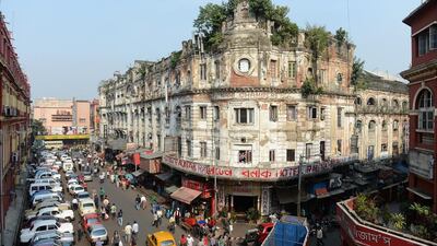 Many of the glorious buildings in downtown Kolkata are derelict, with vegetation growing out of their walls. Gareth Copley / Getty Images