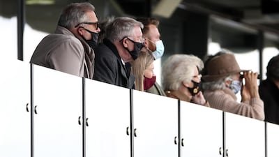 Alex Ferguson at the granstands at Aintree. Getty