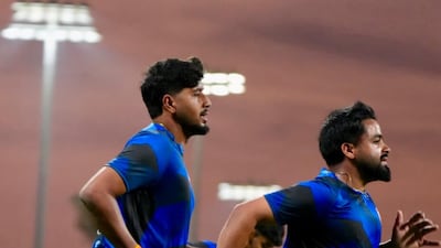 Punjab Kings players Yash Thakur, left, and Prabhsimran Singh during training