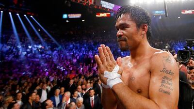 Manny Pacquiao after his bout against Floyd Mayweather Jr on May 2, 2015, that he lost. Al Bello / Getty Images / AFP