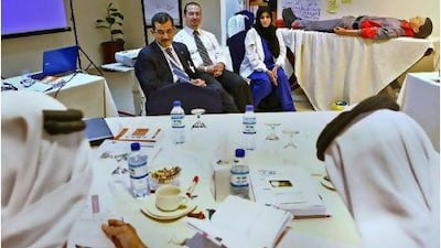 Participants attend a Sphere Project disaster-response training session in Abu Dhabi.