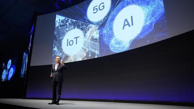 Ken Miyauchi, president and chief executive officer of SoftBank speaks during the SoftBank World 2019 event in Tokyo. The telecom giant is about to free up billions of dollars in debt following the T.Mobile-Sprint tie-up allowing it to push ahead with its Vision Fund ambitions. Bloomberg