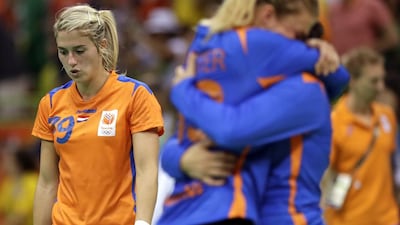 Netherlands’ Estavana Polman, left, leaves the field after losing the women’s bronze medal handball match between the Netherlands and Norway at the 2016 Summer Olympics in Rio de Janeiro, Brazil, Saturday, August 20, 2016. Matthias Schrader / AP Photo