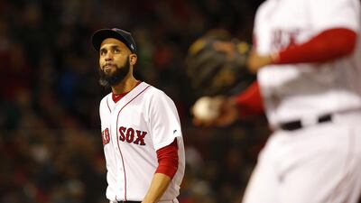 Boston Red Sox pitcher David Price walks off after the end of the top of the fifth inning of game two of the World Series at Fenway Park in Boston. EPA