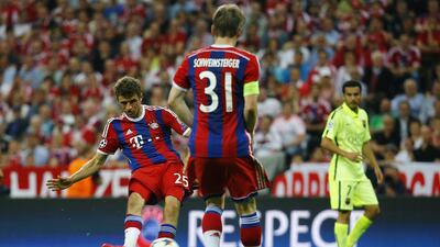 Bayern Munich’s Thomas Muller shoots and scores for their third, winning goal on Tuesday night in the 3-2 Champions League semi-final second leg victory - but 5-3 aggregate defeat - against Barcelona. Kai Pfaffenbach / Reuters