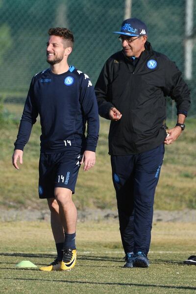 Maurizio Sarri, right, does not work for Napoli anymore and has been replaced by Carlo Ancelotti. Ciro Fusco / EPA