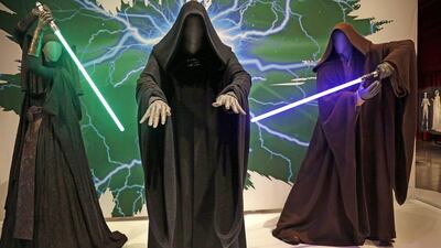 Sith robes and lightsabers are displayed. AP
