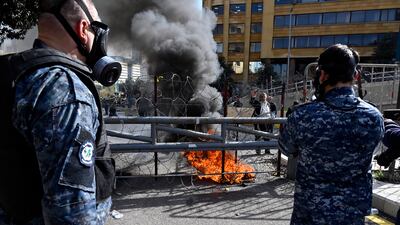 Protesters burn tires during the protest. EPA
