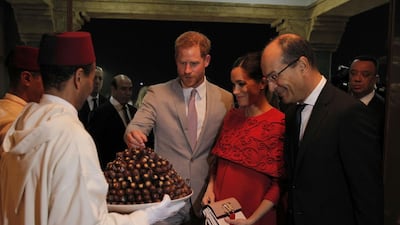 Prince Harry, Duke of Sussex, and Meghan, Duchess of Sussex arrive at Casablanca Airport. AFP