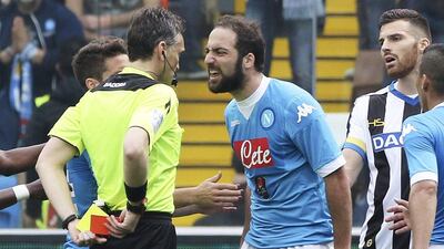 Napoli's Gonzalo Higuain argues with referee Massimiliano Irrati before being sent off in a 3-1 defeat to Udinese. Lancia Ansa / AP