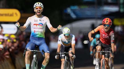 TotalEnergies team's French rider Anthony Turgis, left, pips Ineos Grenadiers' British rider Tom Pidcock at the finish line to win Stage 9 of the Tour de France in Troyes on July 7, 2024. AFP