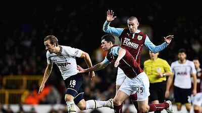 Harry Kane, left, of Tottenham Hotspur is closed down by Michael Keane of Burnley during their Premier League match at White Hart Lane on December 20, 2014 in London, England. (Photo by Laurence Griffiths/Getty Images)