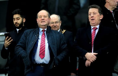 Rochdale CEO David Bottomley, left, says Football League must support smaller clubs. Getty Images