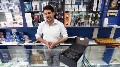 This BlackBerry is one of several models Bassam Moussa sells at United Mobile in Abu Dhabi.